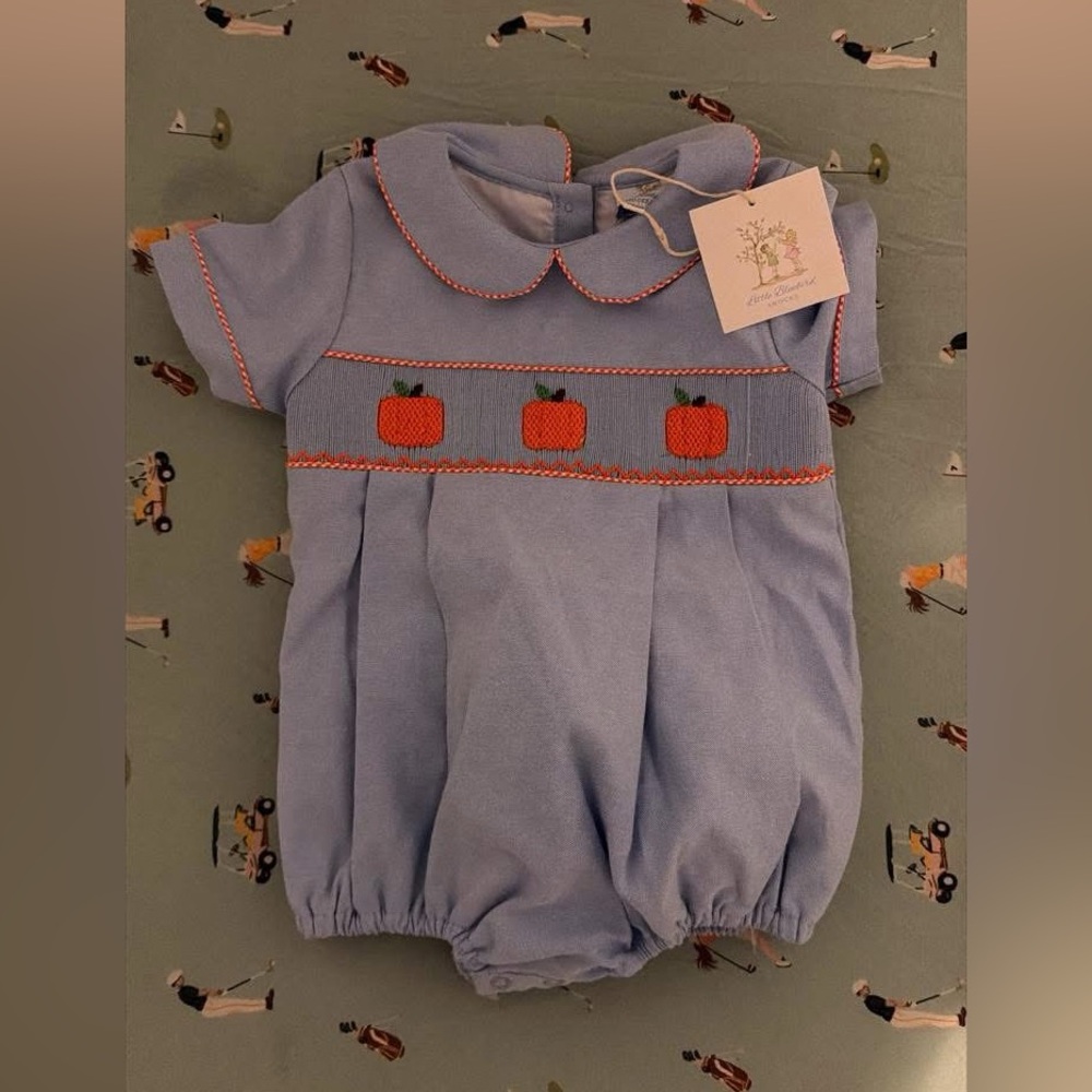 Blue Romper with Red Accents